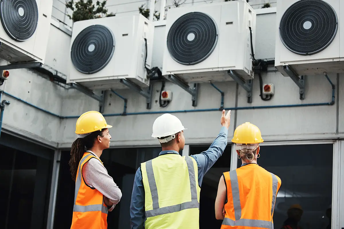 Group Inspecting HVAC Units