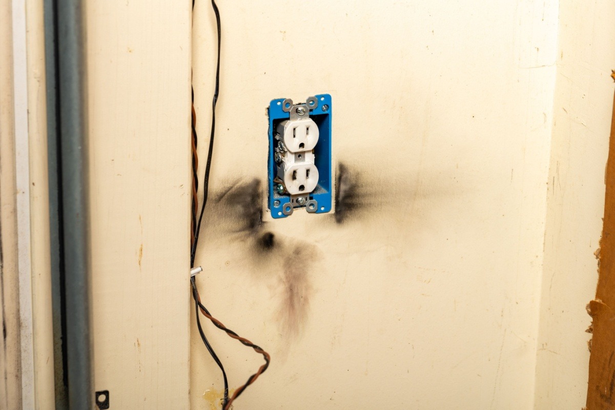Featured image for “Why Is There a Burning Smell From My Outlet? Causes & Next Steps”